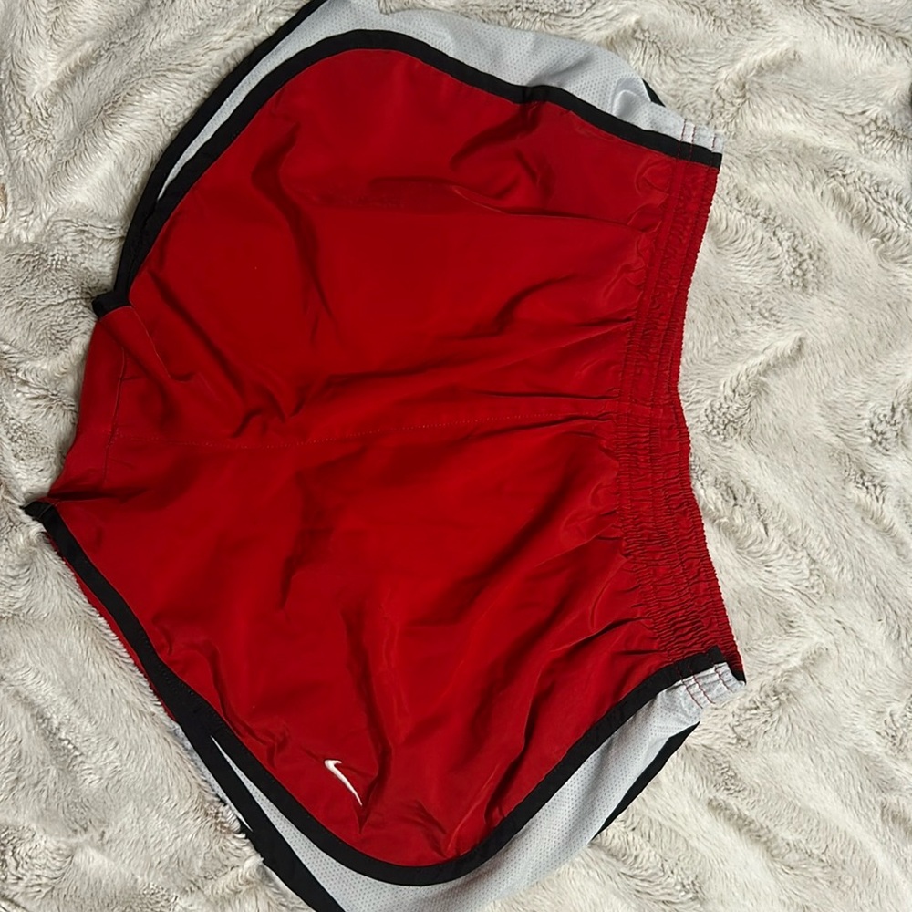 Red Nike shorts